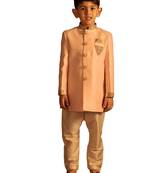 boy's pink and cream sherwani set