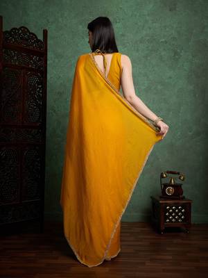 Yellow fendy chiffon saree with running blouse 2
