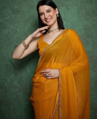 Yellow fendy chiffon saree with running blouse 3