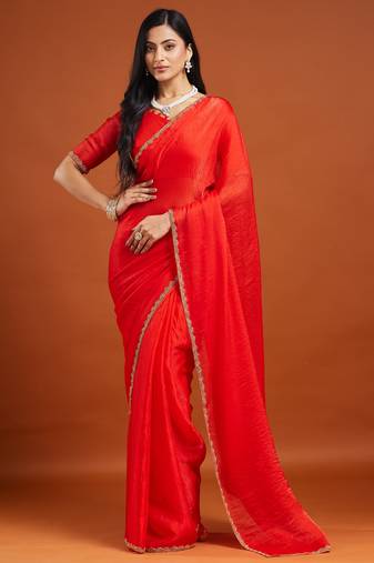 Red color fendy chiffon saree with running blouse