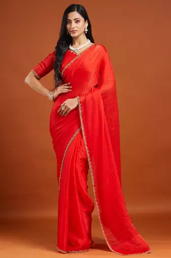Red color fendy chiffon saree with running blouse