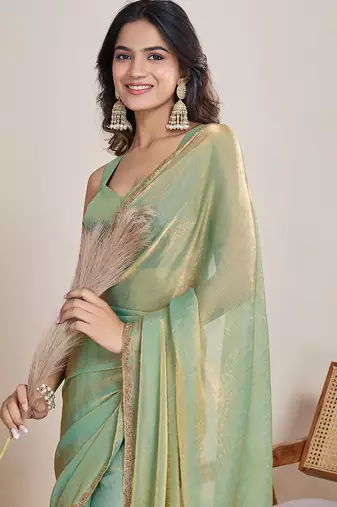 Pista color fendy chiffon saree with running blouse