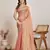 Peach color fendy chiffon saree with running blouse