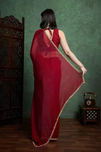 Maroon color fendy chiffon saree with running blouse