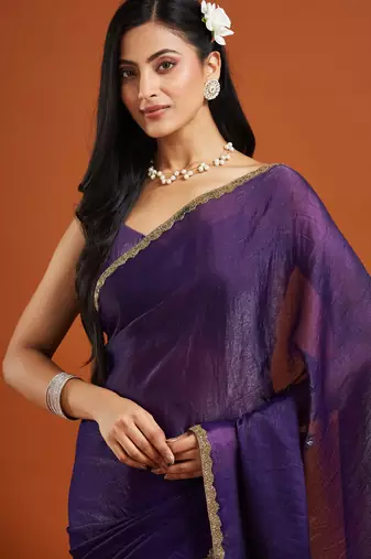 Magenta color fendy chiffon saree with running blouse