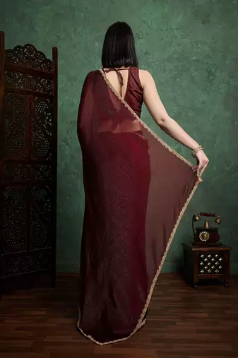 Brown color fendy chiffon saree with running blouse