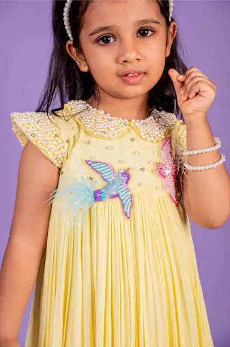 Yellow embroidered cotton dress