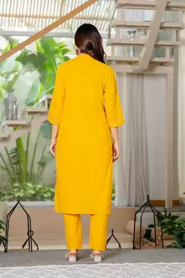 Yellow embroidered cotton kurta and pant set 5