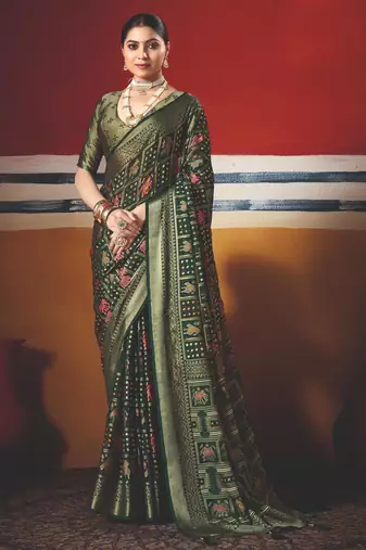 dark green brasso border work saree