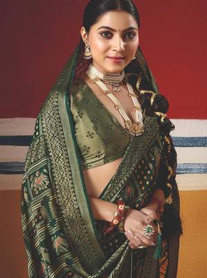 dark green brasso border work saree 3