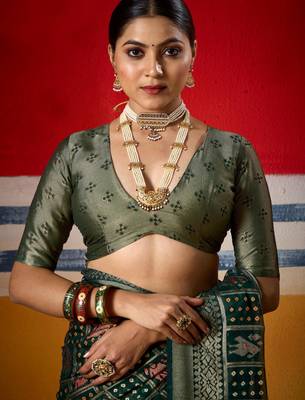 dark green brasso border work saree 4