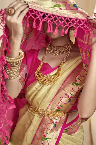 baige & pink tissue paithani silk blend zari weaving with tussel  wedding wear saree