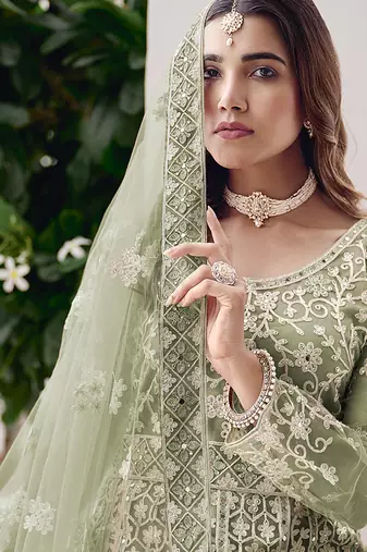 Pista green net embroidered readymade  gown