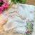 designer tabby silk based white printed saree with hand work