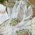 designer tabby silk based white printed saree with hand work