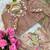 designer tabby silk based beige printed saree with hand work