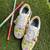 Yellow mirror embroidered leather sneaker