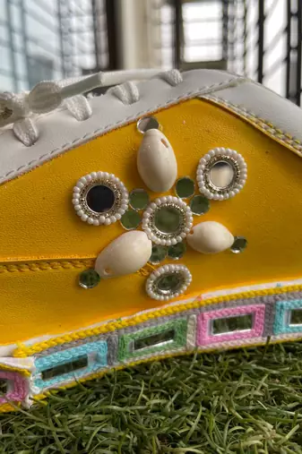 Yellow mirror embroidered leather sneaker