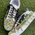 Black mirror embroidered leather sneaker