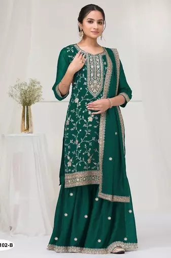 Dark green vichitra semi stitched suit with heavy embroidery work