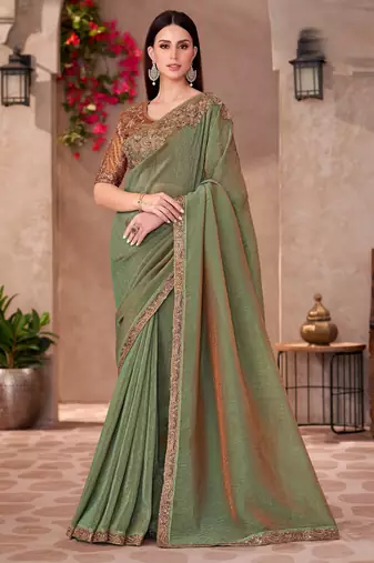 Green golden shine georgette saree with linen work blouse