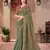Green golden shine georgette saree with linen work blouse