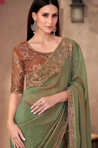 Green golden shine georgette saree with linen work blouse