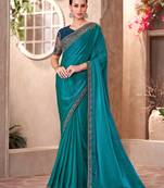 Peacock blue satin georgette saree with linen work blouse