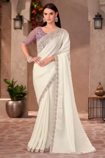 Pearl white shining georgette saree with linen work blouse