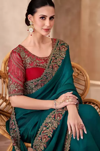 Teal blue sparkle shaded chiffon saree with georgette work blouse