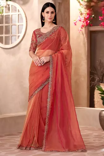 Rust golden sparkle tissue saree with linen work blouse