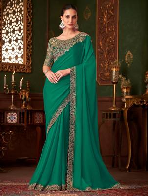 Green magic satin silk blend saree with satin silk blend blouse 1