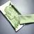 Green printed satin saree with blouse piece