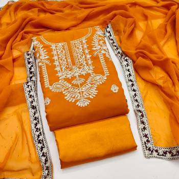  yellow heavy embroidery & fancy border georgette dress material 1