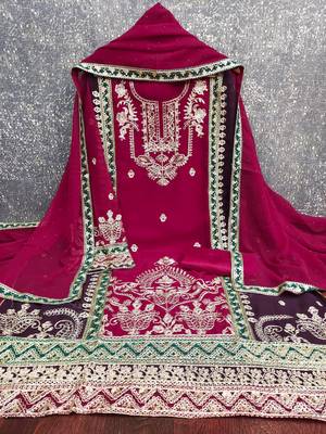 magenta heavy embroidery & fancy border georgette dress material 2