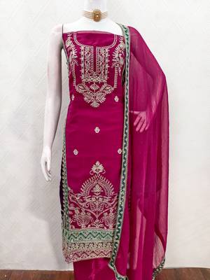  magenta heavy embroidery & fancy border georgette dress material 3
