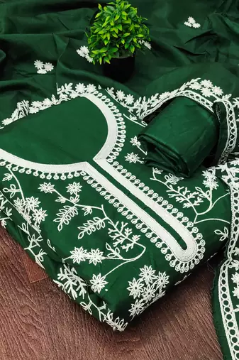  green heavy thread embroidery & fancy border jalpari silk dress material