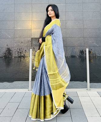 Grey handloom linen with gold zari border 1