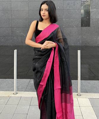 Black handwoven  linen saree with contrast pink border 1