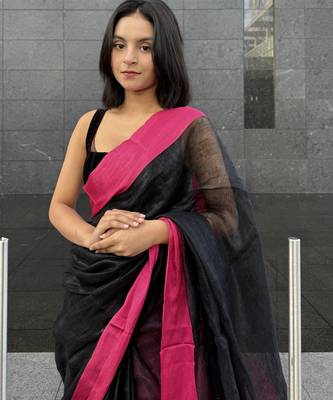 Black handwoven  linen saree with contrast pink border 2