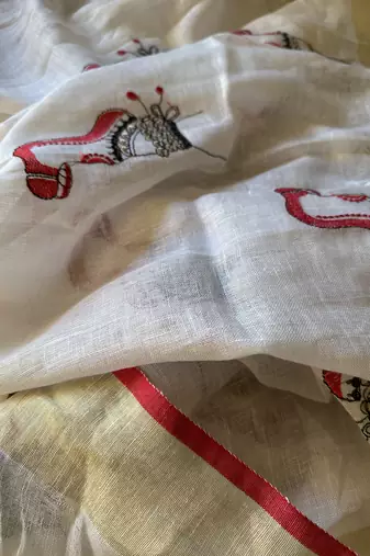 Handwoven white linen saree with embroidery work