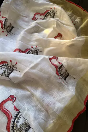 Handwoven white linen saree with embroidery work