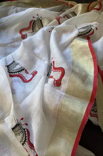Handwoven white linen saree with embroidery work
