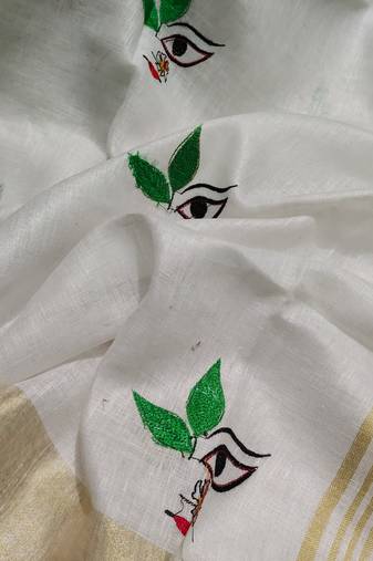 Handwoven white linen saree with embroidery work