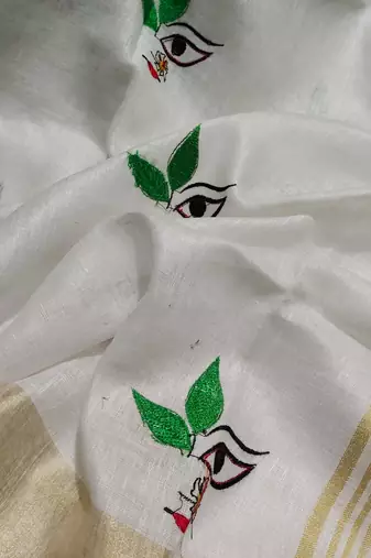 Handwoven white linen saree with embroidery work