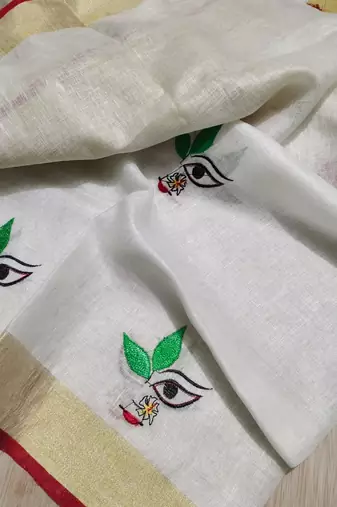Handwoven white linen saree with embroidery work