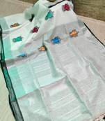 Handwoven white linen saree with embroidery work