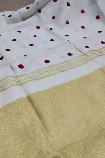 Handwoven white linen saree with heart embroidery work