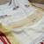 Handwoven white linen saree with embroidery work