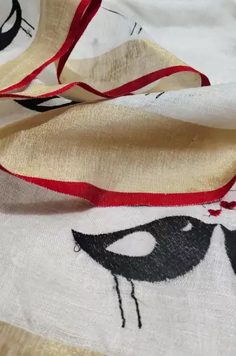 Handwoven white linen saree with embroidery work